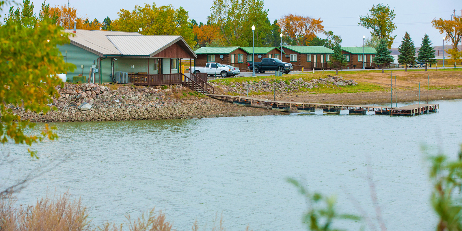 Dock at the Bay with cabins in the background