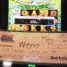 Large winner check on slot machine