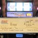 Large winner check on slot machine